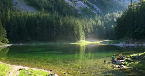 Panoramic view of the green lake in the mountains. Green algae on the surface Stock Footage 246287276