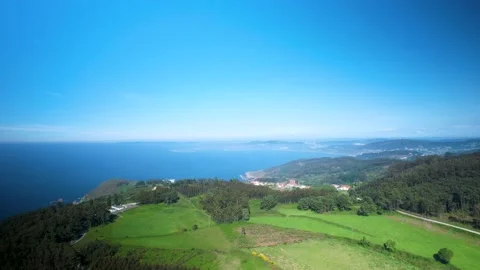 Panoramic View Of Green Meadow, Forest, Blue Sky, And Ocean Stock Footage 234408272