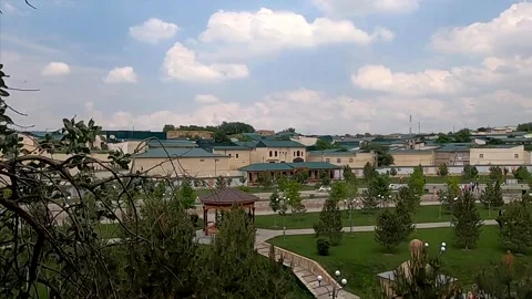 Panoramic view of a green park and buildings in Samarkand, Uzbekistan Stock Footage 336454105