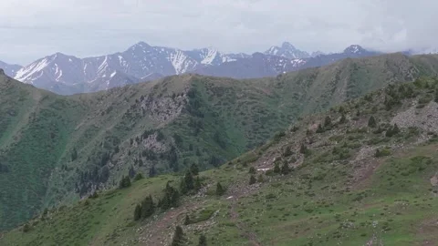 Panoramic view of green Trans-Ili Alatau peaks Stock Footage 345388237