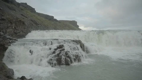 Panoramic view of Gullfoss waterfall and early spring lanscape picture. Gullfoss Stock Footage 94107073