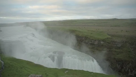 Panoramic view of Gullfoss waterfall and early spring lanscape picture. Gullfoss Stock Footage 94107218