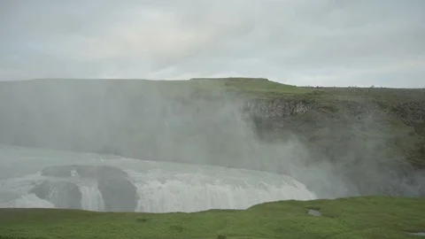 Panoramic view of Gullfoss waterfall and early spring lanscape picture. Gullfoss Stock Footage 94107755