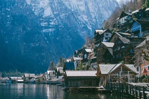 Panoramic view of Hallstatt village located in Austria against white rocky mo Stock Photos