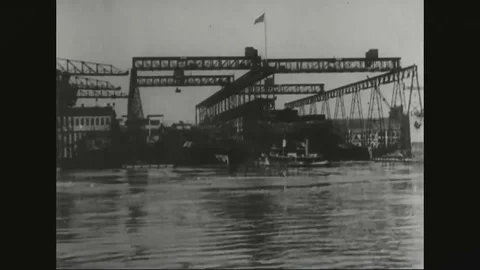 Panoramic view of harbor and a ship being launched during World war I Stock Footage 83413237