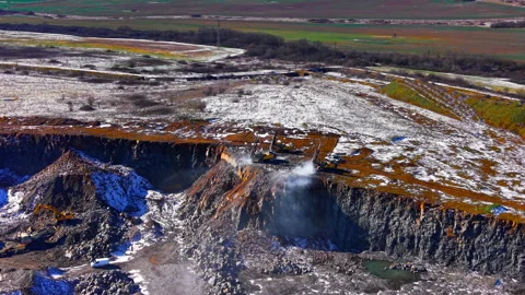Panoramic view of heavy drilling machines on a cliff edge, Bulgaria Stock Footage 336730173