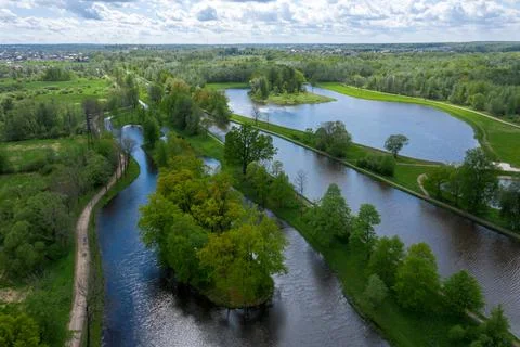 A panoramic view from a height of the ponds and the Landscape Park in Peterhof Stock Photos