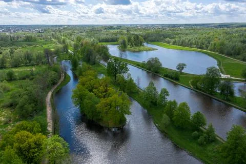 A panoramic view from a height of the ponds and the Landscape Park in Peterhof Stock Photos