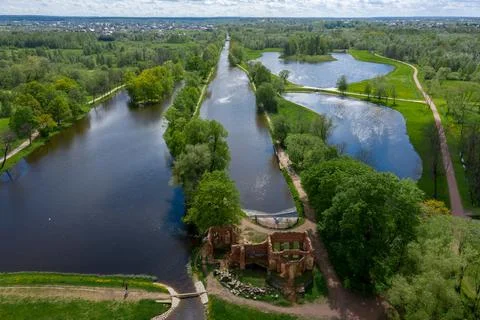 A panoramic view from a height of the ponds and the Landscape Park in Peterhof Stock Photos
