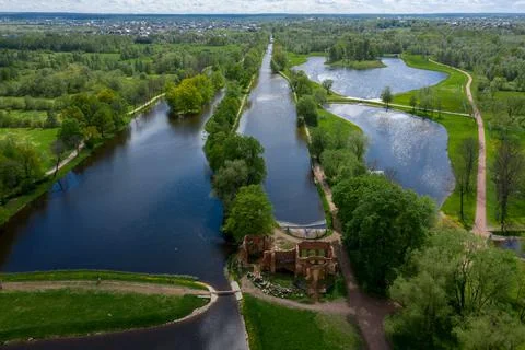 A panoramic view from a height of the ponds and the Landscape Park in Peterhof Stock Photos