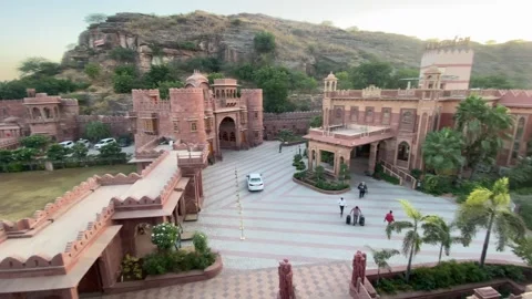 Panoramic view of heritage resort by the hills at sunset 스톡 동영상 332920960