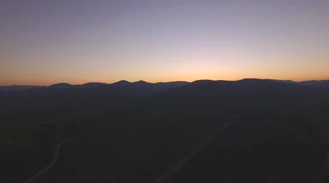 Panoramic View High Above Lush Rolling Hills at Dusk 库存影片 62492996