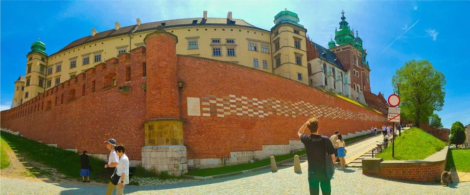 Panoramic view of high brick wall of Wawel Royal Castle in Krakow. Poland Stock Photos
