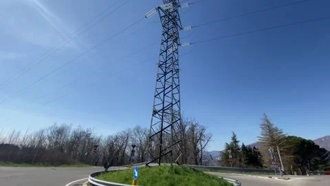 Panoramic view of a high voltage electricity pylon Stock Footage 236057061