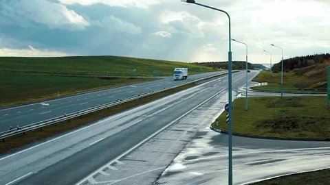 Panoramic view Highway road traffic. Truck TIR transportation cargo Stock Footage 83417855