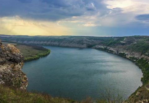 Panoramic view from the hill on bend of the river. Beautiful summer landscape Stock Photos