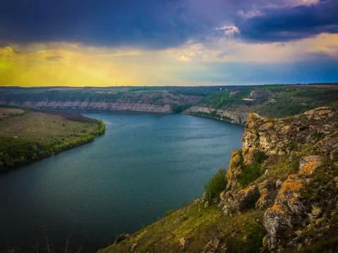 Panoramic view from the hill on bend of the river. Beautiful summer landscape Stock Photos