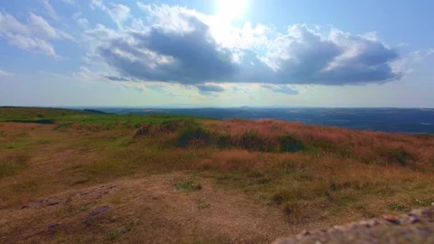 Panoramic view from hill summit with dramatic cloudy sky in Ireland Stock Footage 340436240