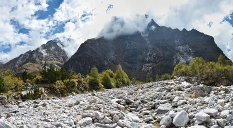 Panoramic view of the Himalayan Mountains on the way to Kangchenjunga base ca Stock Photos