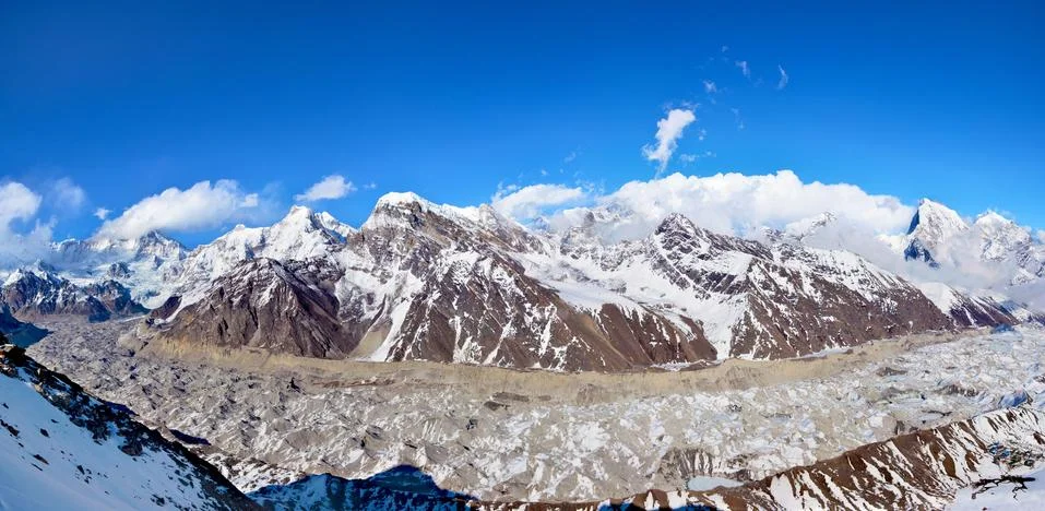Panoramic view of the Himalayan range and glacier from top of Mt. Gokyo Ri. Stock Photos