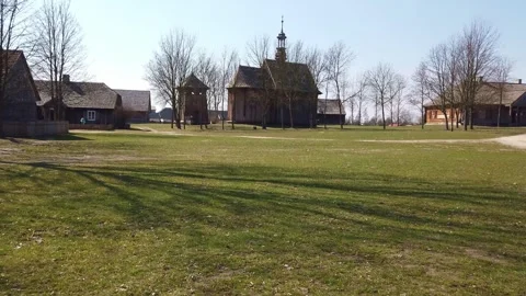 Panoramic View of Historic Celtic Village with Church and Wooden Houses Stock Footage 342131220