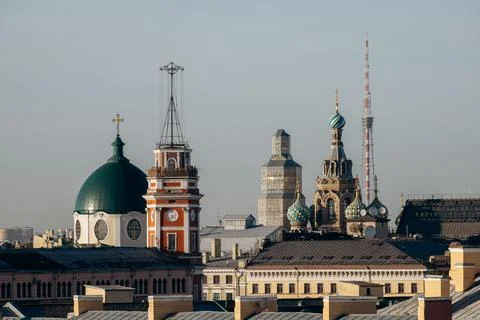 Panoramic view of historic city rooftops featuring the colorful Church on Foto stock