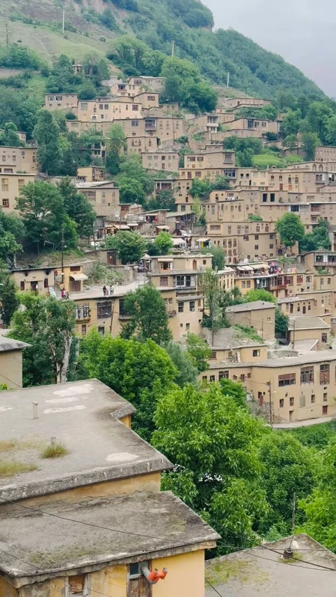 Panoramic view of a historic terraced mountain village, Vídeos de archivo 336848863