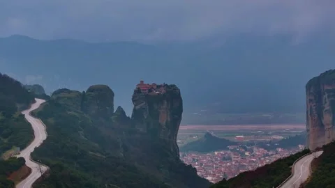 Panoramic View of Holy Trinity Monastery Winding Road and Kalambaka in Meteora Video stock 344190310