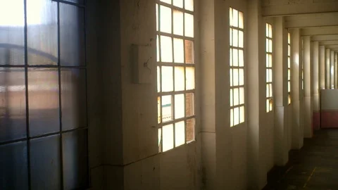 Panoramic view of a huge abandoned empty industrial hangar, Stock Footage 100883936