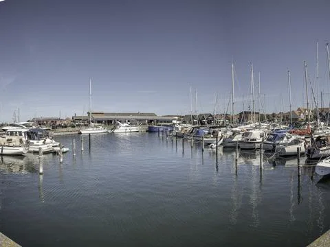 Panoramic view in Hundested marina vith moored sailboats Stock Photos