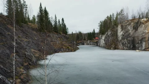 A panoramic view of an ice-covered marble quarry in Karelia. Stock Footage 139487383