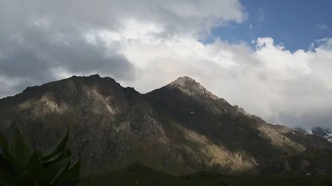 Panoramic view of idyllic mountain scenery  with fresh green meadows 動画素材 87750614