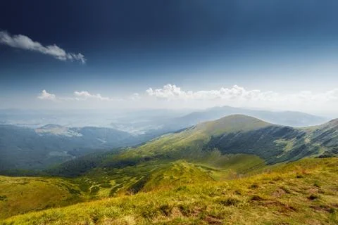 Panoramic view of idyllic mountain scenery Stock Photos