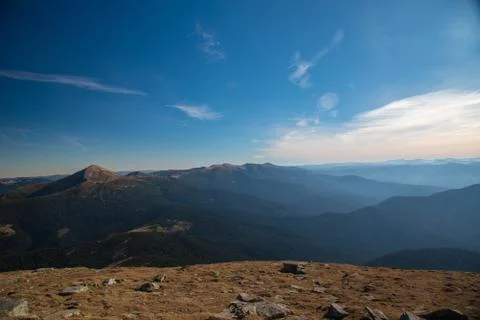 Panoramic view of idyllic mountain scenery in sunny day Stock Photos