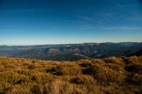 Panoramic view of idyllic mountain scenery in sunny day Stock Photos