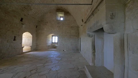 Panoramic view of interior of empty hall of old stone fortress in sunny day Stock Footage 115392379