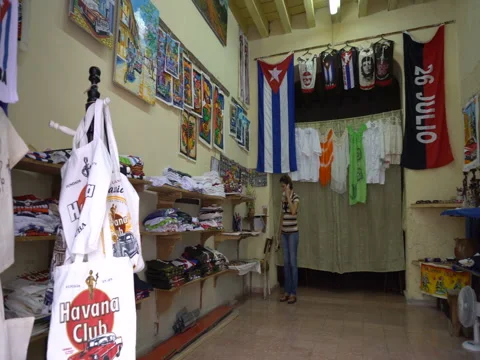 Panoramic view to an interior of the souvenir store in Havana Stock Footage 71036693