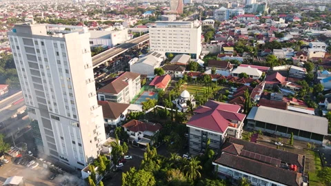A Panoramic View of the Island Cityscape Bathed in Sunlight in Sulawesi Stock Footage 296808174