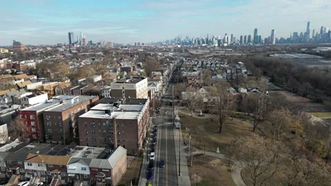 A panoramic view of  Jersey city a New york city  across a body of water.  In Stock Footage 296824604