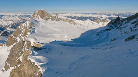 Panoramic View of Kaprun Ski Resort from Kitzsteinhorn in Sunny Winter Alps Stock Footage 324575351