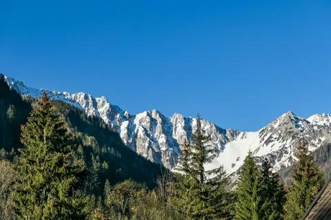 Panoramic view of Karawanks mountain range on sunny day in Carinthia, Austr.. Stock Photos