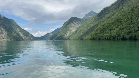 Panoramic view of Konigssee Lake. Boat sails through the lake. Bavaria, Germany 動画素材 337882001
