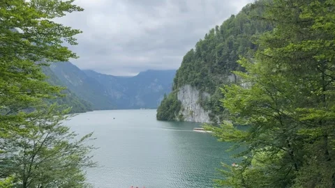 Panoramic view of Konigssee Lake. Motion of water, boats. Bavaria, Germany Stock Footage 333584173