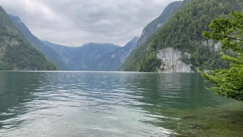 Panoramic view of Konigssee Lake. Motion of water, boats. Bavaria, Germany 스톡 동영상 333584192