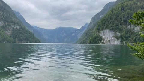 Panoramic view of Konigssee Lake. Motion of water, boats. Bavaria, Germany Stock Footage 333584214