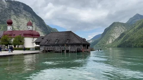 Panoramic view of Konigssee Lake. St. Bartholomew church and boathouse. Germany Stock Footage 337881786