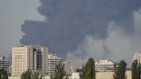 Panoramic view of Kyiv skyline with heavy black smoke after air attacks Video stock 344010465