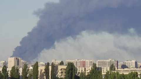 Panoramic view of Kyiv skyline with heavy black smoke after air attacks Video stock 344010547
