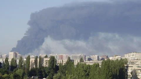 Panoramic view of Kyiv skyline with heavy black smoke after air attacks Video stock 344011175