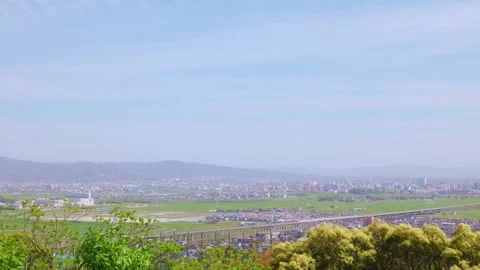 Panoramic view of Kyushu Shinkansen viaduct and Kurume cityscape Vídeos de archivo 333205257